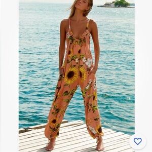 Agua Bendita Africa Sunshower Jumpsuit
Size Small